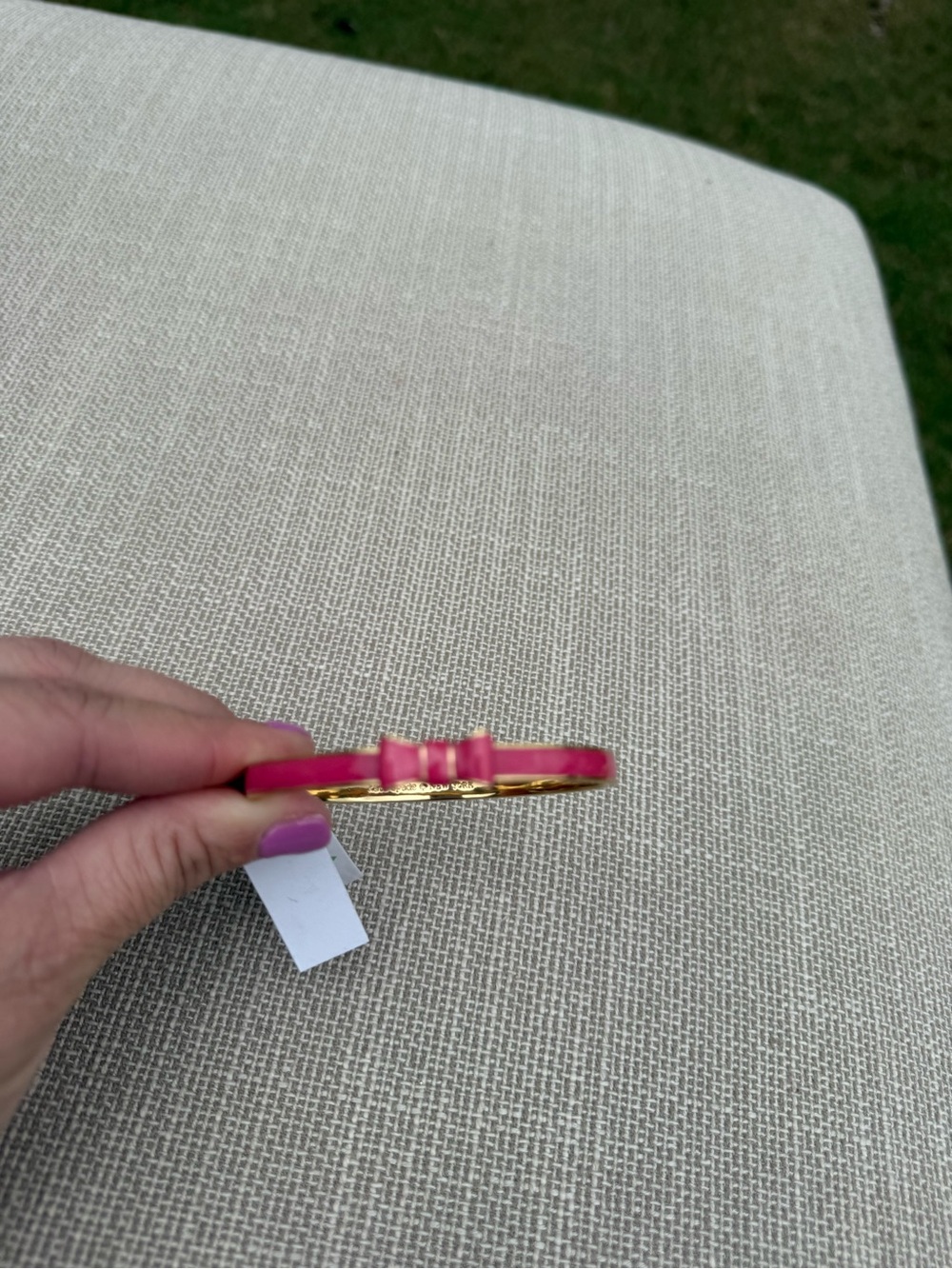 Kate Spade Gold-Tone Bracelet with Pink Enamel Bow Accent